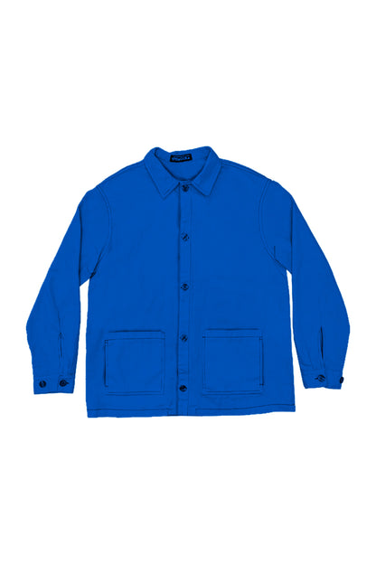 sobrecamisa unisex en color azul electricoen algodón orgaíco con botones en tinta y bolsillos y cierre con botones y botones en el cierre doble de las mangas